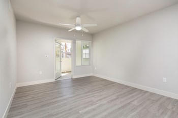 Ceiling fan and hardwood floor Living Room at The Seaton Apartments in San Diego CA